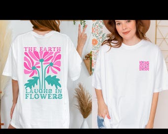 Camiseta "La Tierra ríe en flores" con colores reconfortantes: cita de Ralph Waldo Emerson, diseño floral