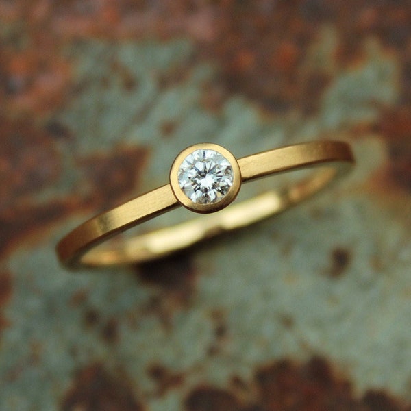 18ct gold ring with diamond 0.17ct (3,55mm)