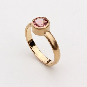 Anillo de oro 750, ancho, con turmalina redonda. imagen 3