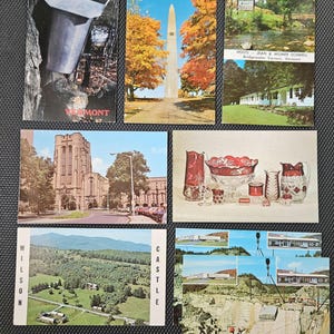 May include: Six vintage postcards featuring various scenes. The first postcard shows a metal bucket hanging from a tree with the word "Vermont" printed on the bottom. The second postcard shows a tall stone monument in a park with autumn foliage. The third postcard shows a river flowing through a green valley with the text "HOSTS - JEAN & WILMER SCHMELL Bridgewater Corners, Vermont". The fourth postcard shows a large brick building with a tall steeple. The fifth postcard shows a collection of red and clear glass jugs and bowls. The sixth postcard shows a quarry with a large rock in the centre and a person standing in the foreground. The text "CASTLE" is printed on the right side of the postcard.