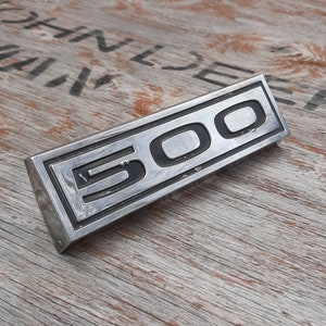 Vintage &quot;500&quot; emblem for a 1963 Ford Galaxie 500 that mounts to fuel door