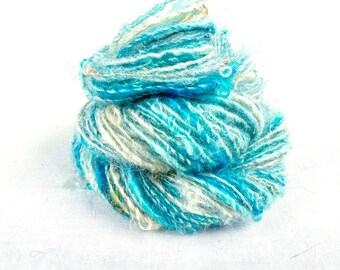 Handspun Single, from Kid Mohair dyed in shades of turquoise and white, "Summer Skies"