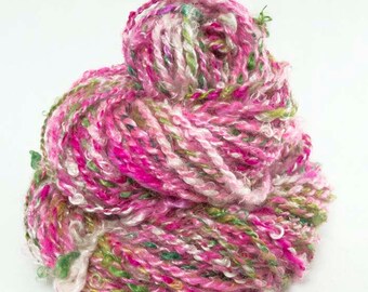 Handspun 2-ply Yarn spun from locks of Kid Mohair, Wensleydale and Silk in fuchsia, rose, pink, natural white and greens