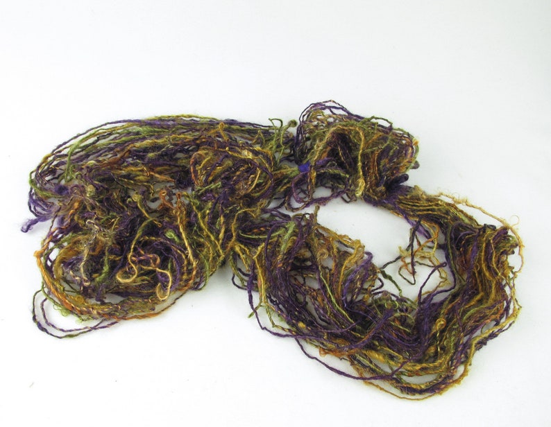 green and gold from Kid Mohair dyed in shades of purple Handspun Single