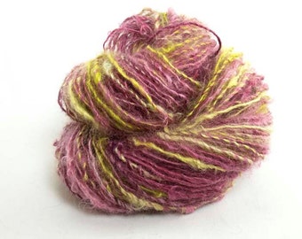 Handspun Yarn. Single from Kid Mohair locks. Dyed in red violet and chartreuse