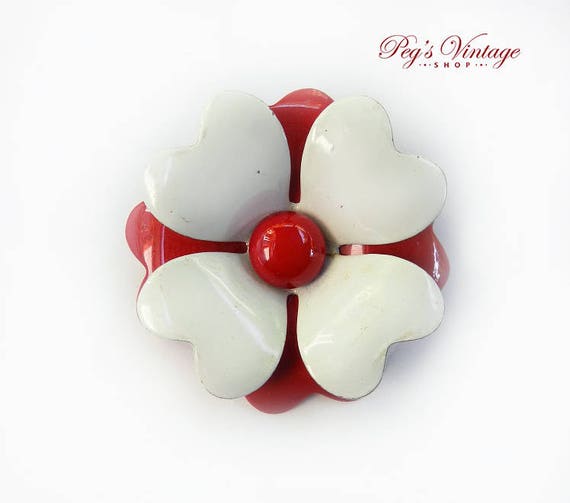 large red brooch
