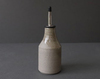 Stoneware oil pourer