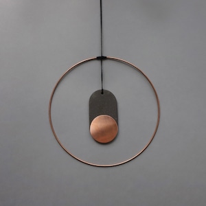 Copper and black ceramic geometric wall hanging