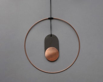 Copper and black ceramic geometric wall hanging