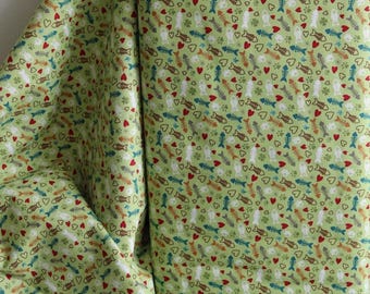 Fish Skeleton Fabric: Henry Glass Cotton, Green Background