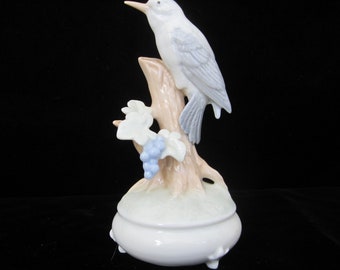 Blue Bird Musical Figurine Porcelain Bird Perched on Vine with Grape Cluster & Leaves Soft Colors Round Pedestal Base Sankyo Movement Japan