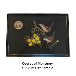 May include: Black lacquered serving tray with a gold and yellow floral design and two brown birds. The tray is 18 inches by 12 1/2 inches.