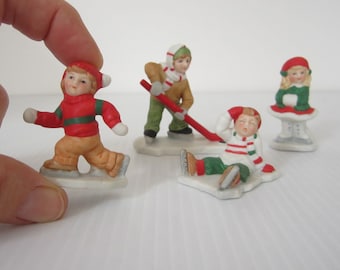 4-Pc Lefton Figurines Colonial Village Children in the Snow • Vintage 1980s-90s Hand Painted Miniatures • Outdoor Youth Playing Winter Scene