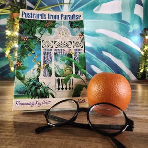 Cartões postais do paraíso, Romancing Key West de June Keith, edição autografada, Não há estranhos no paraíso