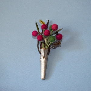 Ahornsirup-Stapel mit Cranberry und grünen Filzbeeren
