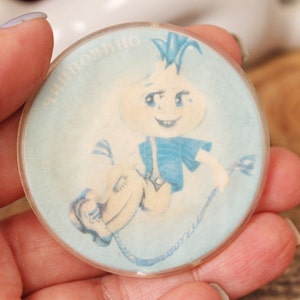 Children's round plastic pin badge - Cippolino - 2.1 inches - cartoon hero, made in USSR, 1970-1980s