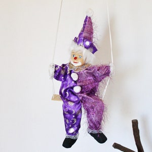 Vintage doll with porcelain face - 22.3 inches - Clown on the swing - Hanging toy - Hand painting. Germany. 1970-1980s