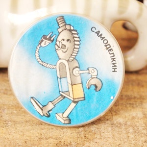 Children's round plastic pin badge Samodelkin - cartoon hero, made in USSR, 1970-1980s