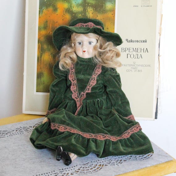 Vintage German Porcelain Doll in Green Velvet Dress with Hat  Fabric Body   Handcrafted Look  Visible Leg Repair - 1960-1980s