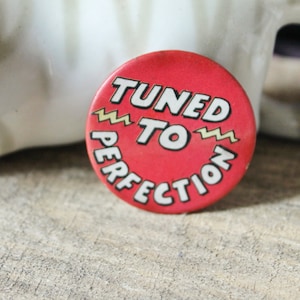 Vintage pin badge "Tuned to Perfection" - 1.5 inches - old pin - vintage badge - 1980-1990s