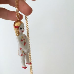 Porcelain doll necklace with cherry pattern, Porcelain cherry necklace, ceramic figurine necklace