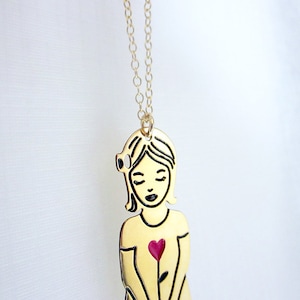 collier poupée Aurore doré