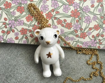 Long porcelain teddy  bear necklace with gold star