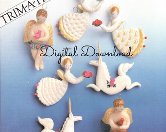 May include: Six handmade Christmas decorations featuring angels and unicorns. The decorations are white with gold accents and feature pink and red details. The decorations are perfect for adding a touch of whimsy to your Christmas tree.