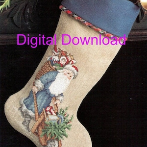 May include: A cross-stitch pattern for a Christmas stocking featuring Santa Claus pulling a wagon full of toys. The stocking is beige with a blue and red plaid trim.