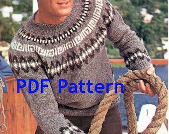 May include: A grey knitted sweater with a white and black geometric pattern. The sweater has a crew neck and long sleeves. The text "PDF Pattern" is superimposed on the image.