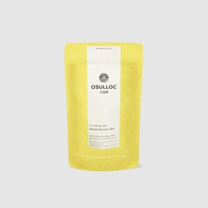 May include: A yellow pouch with a white label that says "OSULLOC" and "SIGNATURE EARL GREY" in black text. The pouch is made of a textured material and has a floral design.