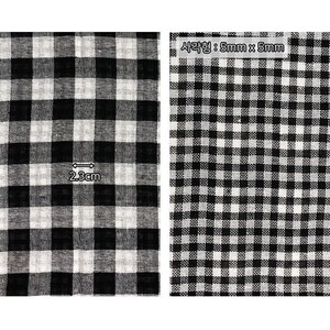 May include: Black and white gingham fabric with a 2.3 inch square pattern. The fabric is woven with a subtle texture. The text in the image reads "사각형: 5mm x 5mm".