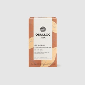 May include: A rectangular box of Osulloc Jeju Volcanic Oolong Tea. The box is primarily brown with a white vertical stripe down the center. The text on the box includes the brand name, tea type, and other details. The net weight is 1.27 oz.