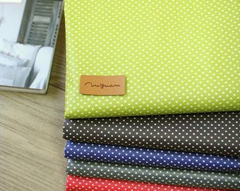 Tela de algodón laminada – Puntos pequeños blancos impermeables, cortada a medida