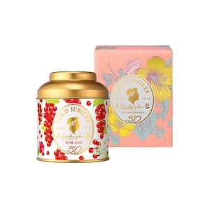 May include: A gold-topped tin and a pink box, both decorated with floral patterns. The tin displays red berries and the words "GOLD JUBILEE" and "50th Anniversary." The box has a similar design and text. The items are likely tea or a similar product.