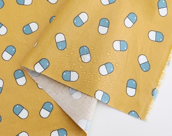 Yellow Vitamin Print TPU Laminated Fabric, Waterproof Cotton by the Yard