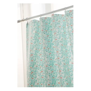 May include: A shower curtain with a white background and a pattern of small green leaves and orange flowers.