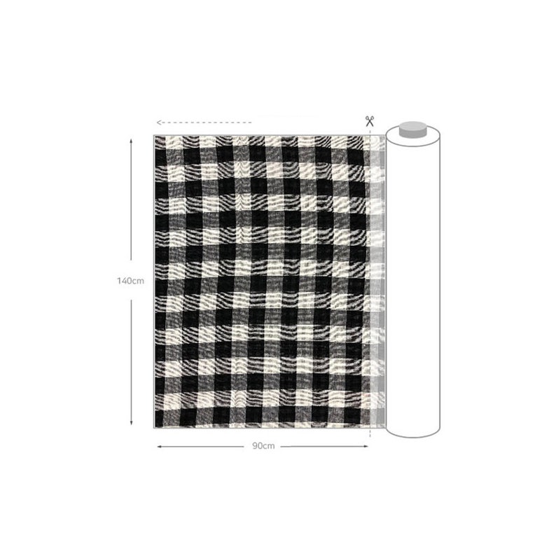 May include: A roll of black and white checkered fabric, measuring 90 inches by 140 inches.
