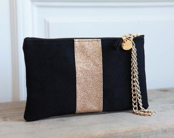 Pochette de soirée noire et paillettes dorées. (suédine et tissu pailleté). Modèle *NORA*