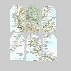 May include: Six rectangular gift tags with a map design. The tags feature different regions, including Manila, Samar, and Luzon. Each tag has a hole at the top for attaching to a gift.