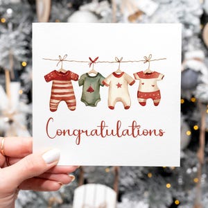 Nouveau thème de Noël de carte de félicitations de bébé, carte de félicitations de vêtements de bébé de fil de lavage de Noël, carte de bébé de genre neutre rouge-vert
