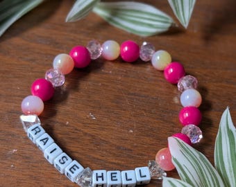 RAISE HELL | feminist beaded word bracelet