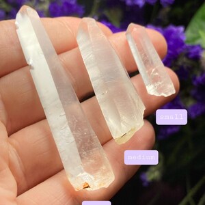 May include: Three clear quartz crystal points of varying sizes, labeled "small", "medium", and "large".