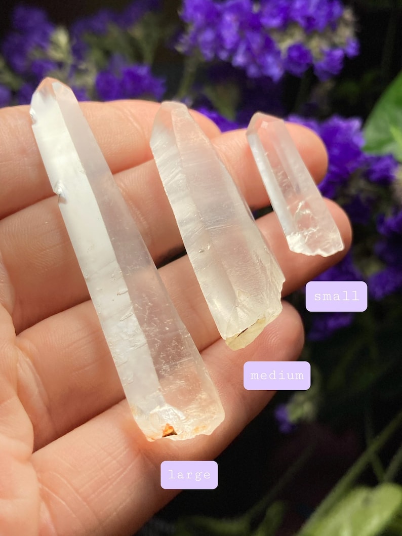 May include: Three clear quartz crystal points of varying sizes, labeled "small", "medium", and "large".