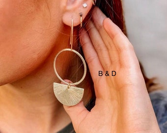 Trendy gold dangle earrings made with acute circle and half moon dangle