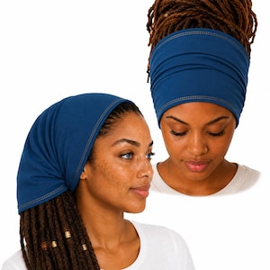 May include: A wide, solid dark blue headband featuring visible gold-toned stitching along the top and bottom edges. The fabric is gathered to create a soft, pleated texture that fits snugly around the head, providing a simple and functional accessory.