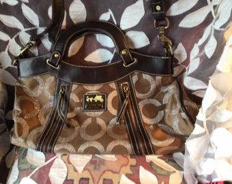 coach est 1941 bolsa price