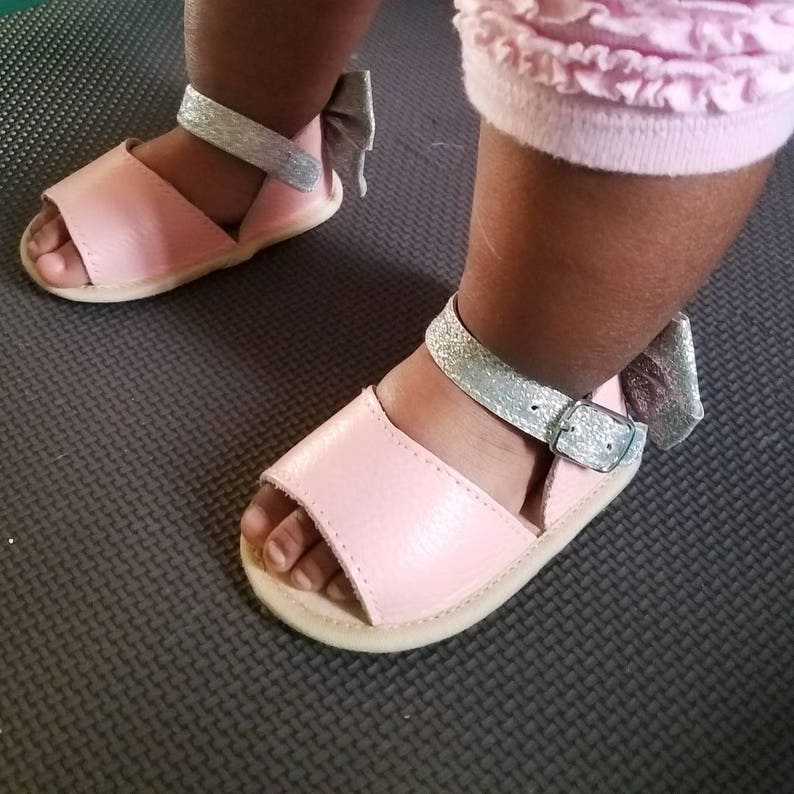 SALE ON SANDALS Infant and Toddler Soft or Rubber Sole Bella Simone Girls Leather Pink /& Silver Glitter Sandals with Bow
