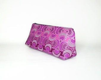 Handmade Make-up bag in beautiful shimmering hourglass print geometric patterned fabric in deep soft pink
