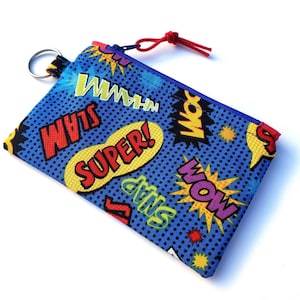 Comic Book Words Coin Purse: superhero text on blue mini wallet with key ring, action words earbuds pouch, lunch money holder, small zip bag
